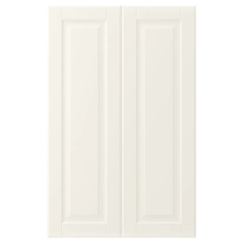 Depicts a white BODBYN cabinet door with bevelled edges and a smooth, lacquered finish. Its rectangular with a traditional design.