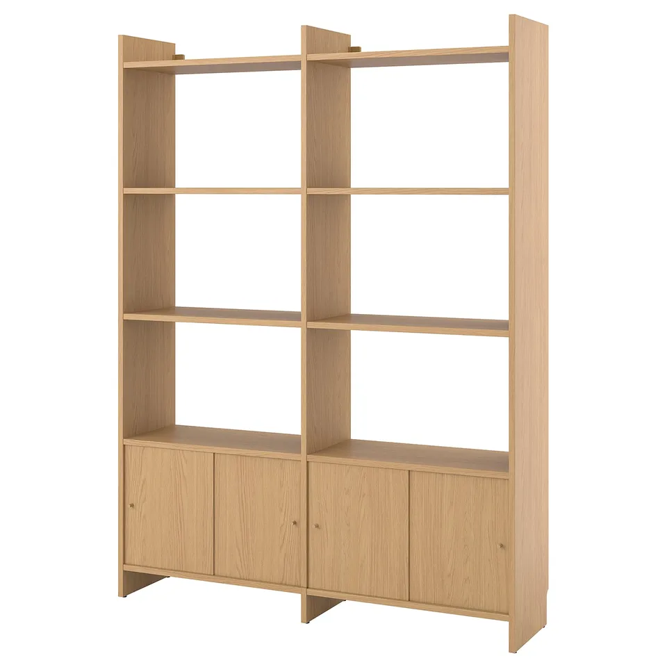 A light brown LÅDMAKARE bookcase with a sleek, minimalist design featuring open shelves and cabinets.