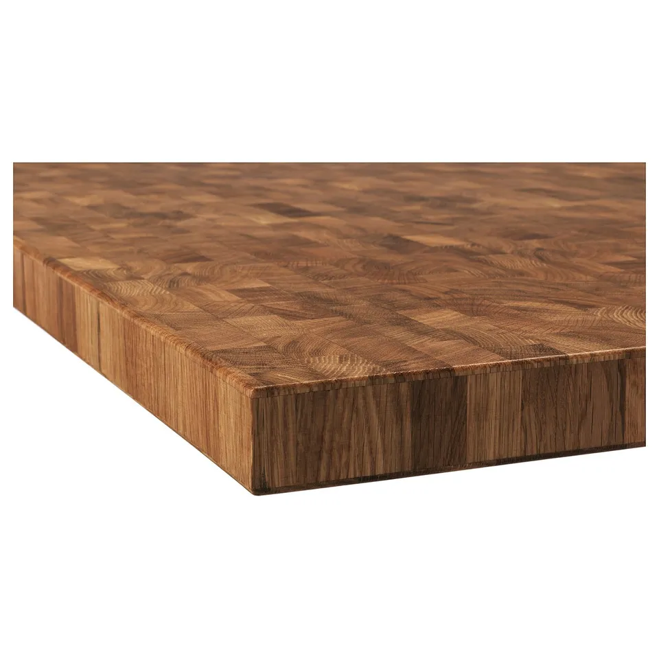 Smooth, rectangular, high-quality oak wood tabletop with intricate end-grain pattern and natural wood finish.