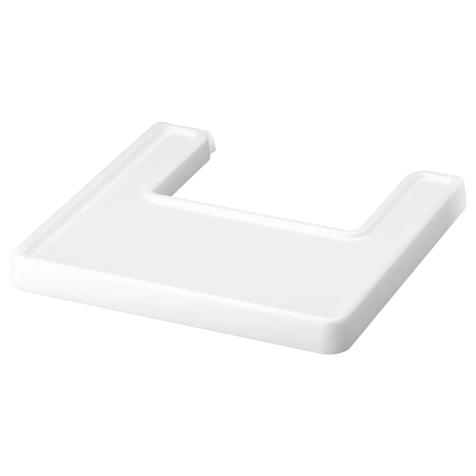 A white plastic tray for children, shaped with raised edges to prevent spills, designed to be easily wiped clean.