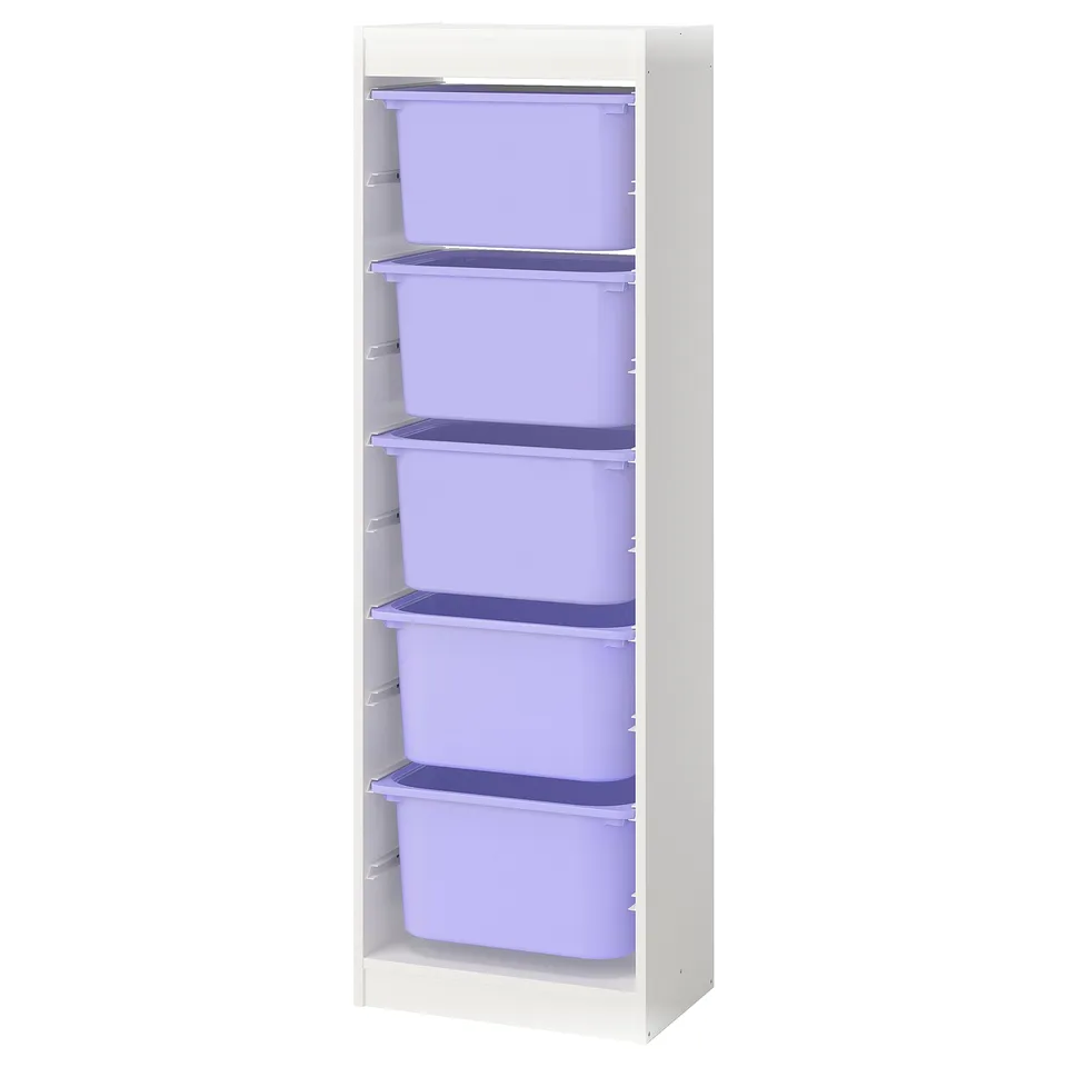 A TROFAST storage unit with purple plastic boxes in a white wooden frame. It has five compartments with four removable boxes.