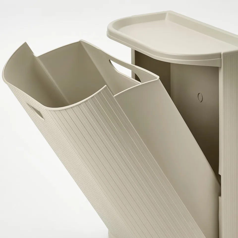 Wall-mounted recycling bin set with sleek design and handles.