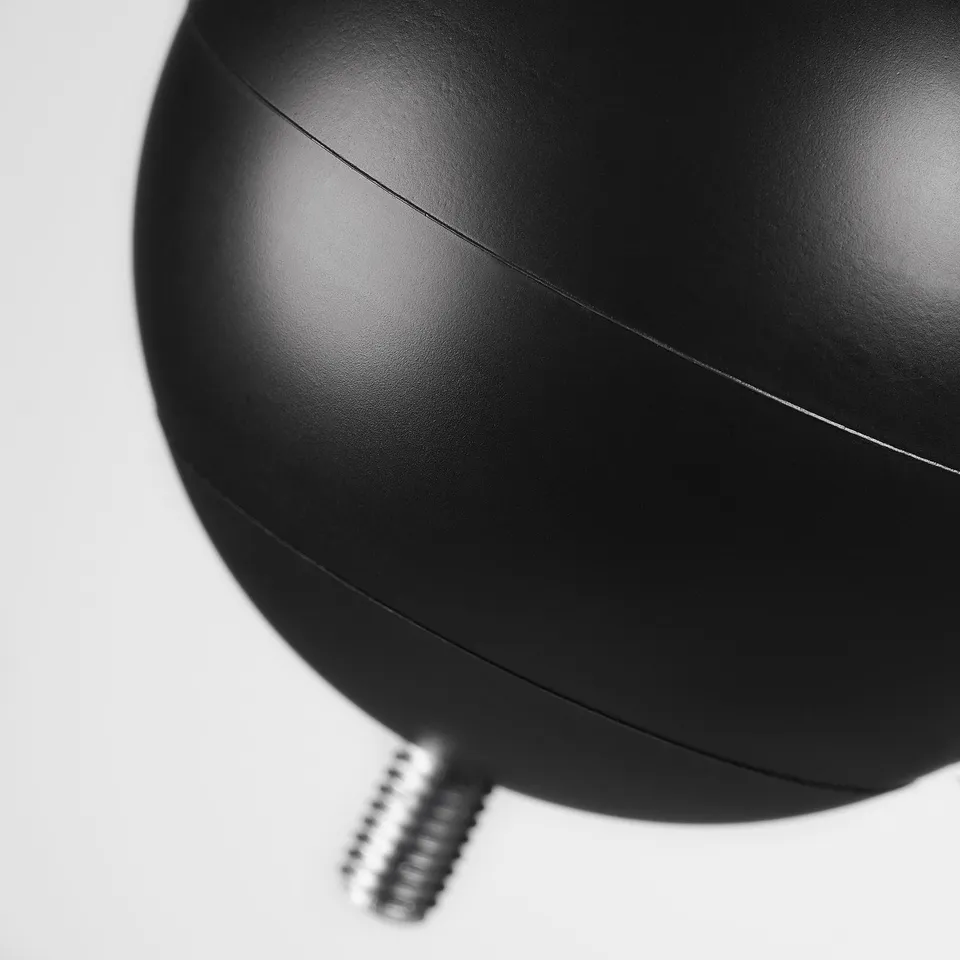 Black spherical finial with matte finish, attached to a threaded metal rod.