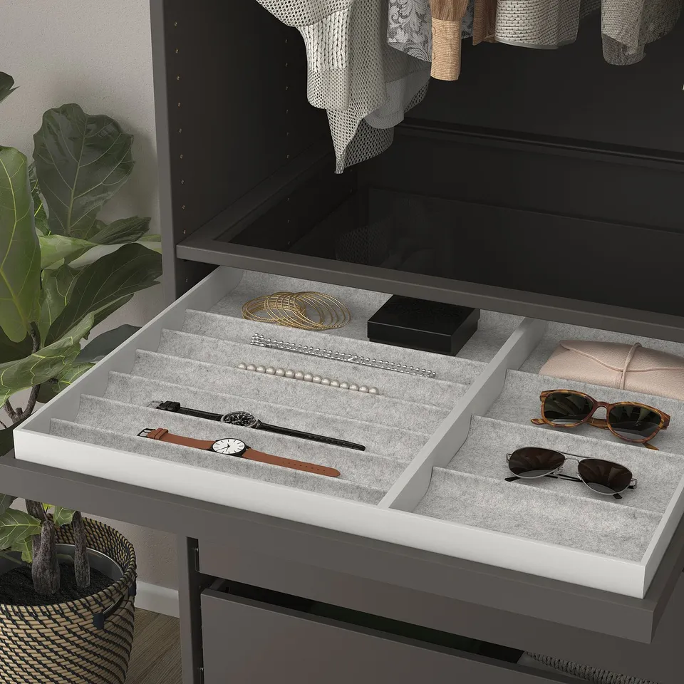 Open drawer tray with jewellery and accessories. Includes compartments, felt liner, and slow-closing mechanism.