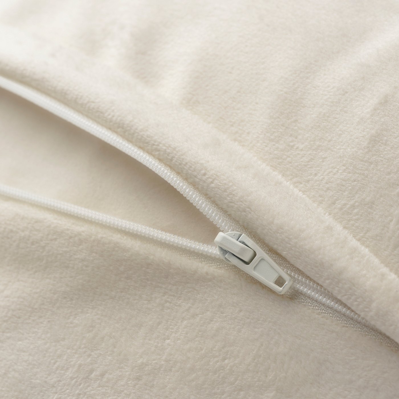 Zippered soft cushion cover, made from recycled polyester.