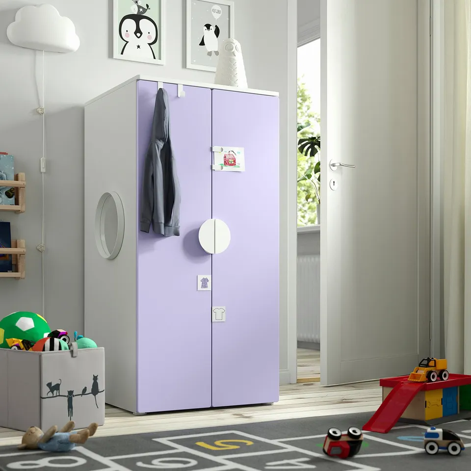 Kids room with SMÅSTAD wardrobe, jacket, mirror, toys, and rug.