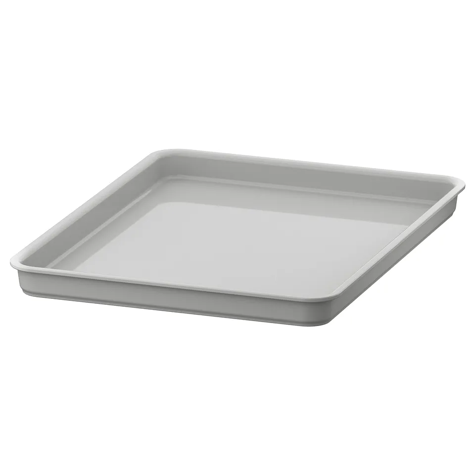 A white, rectangular KUGGIS box lid made of recycled pet plastic, designed to fit KUGGIS boxes, offering dust protection and stacking functionality.
