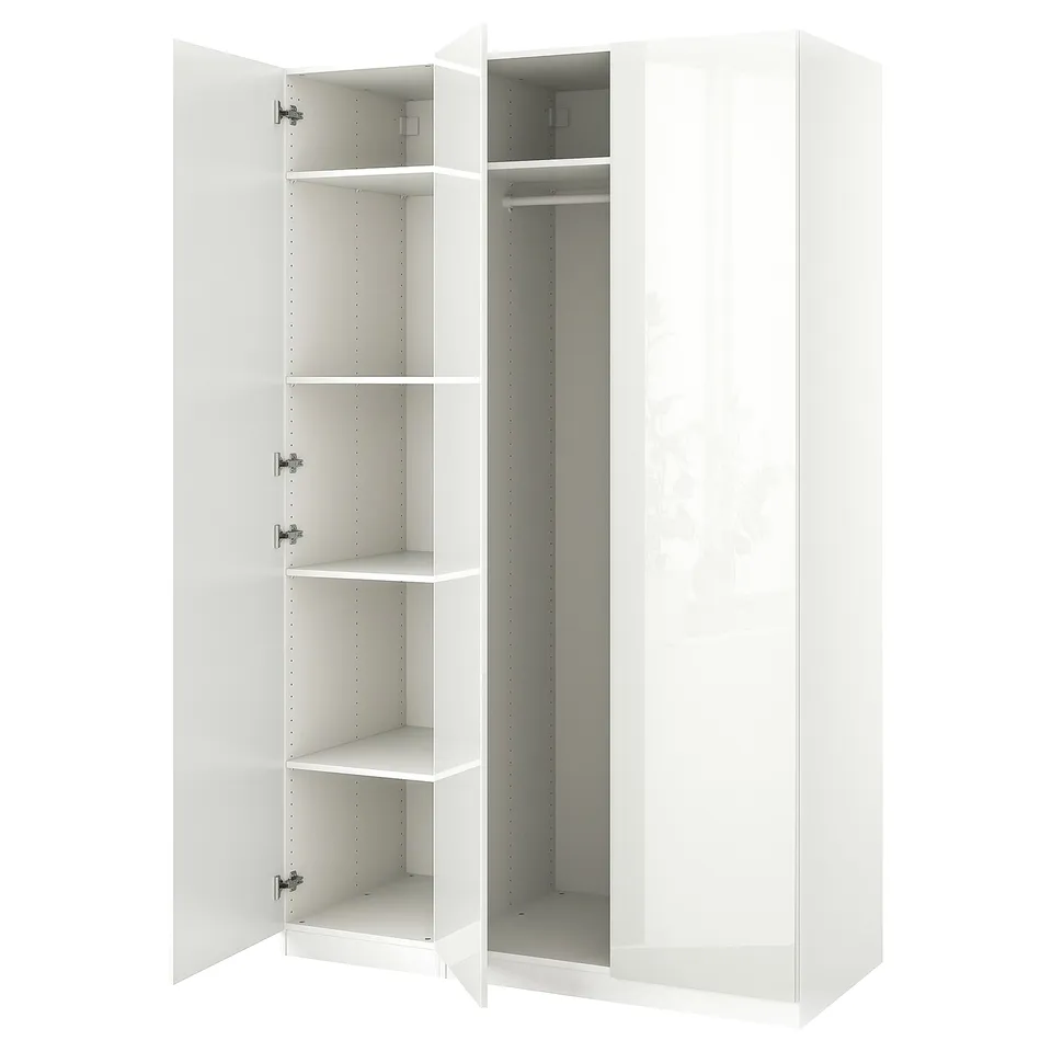An open white PAX wardrobe with shelves and hanging space.