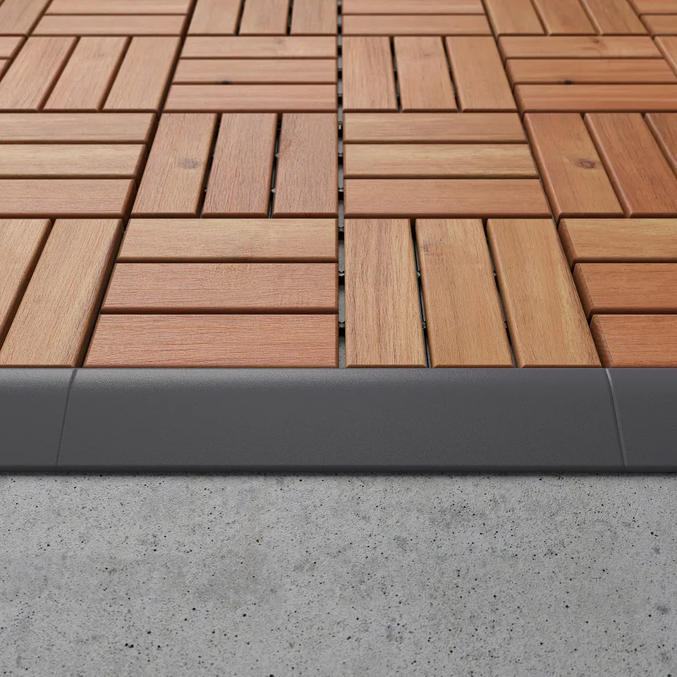 Wooden deck tiles with grey edging.