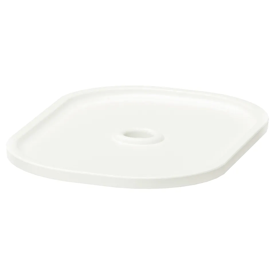 A white TROFAST storage box lid, square-shaped, made of recycled plastic, with a single vent/handle design.