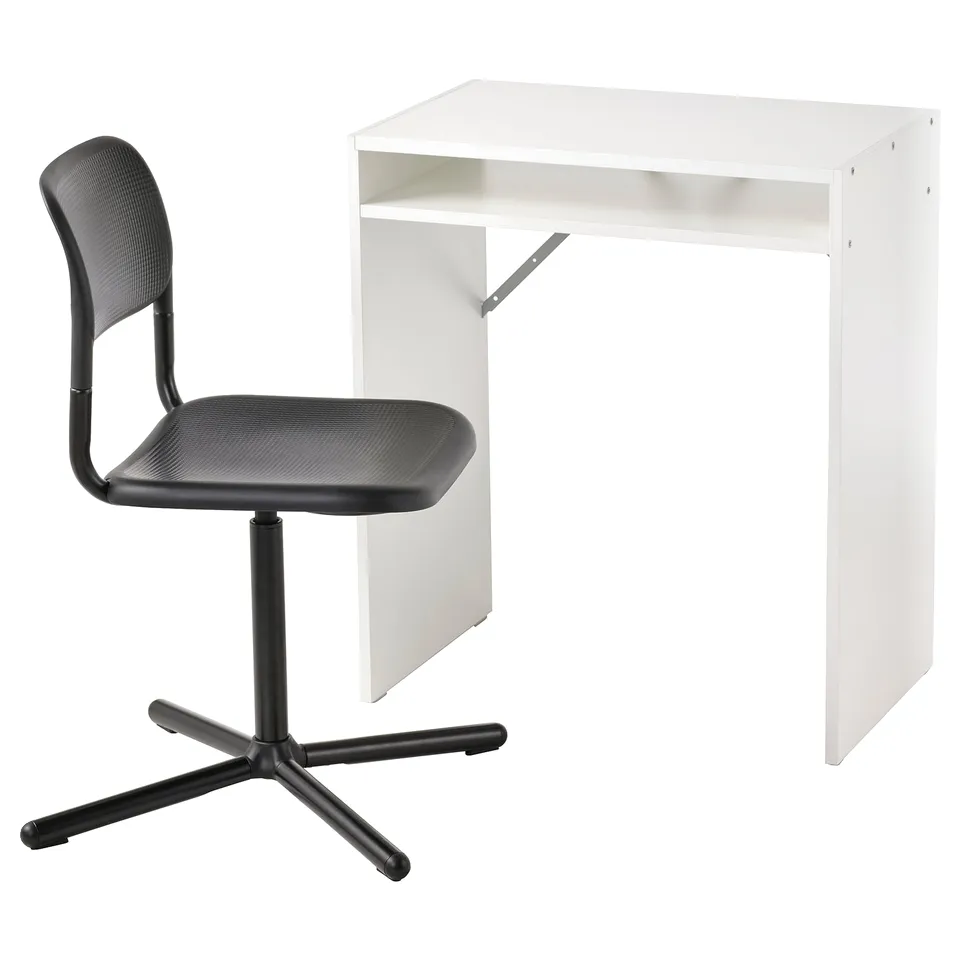 A white TORALD desk with a black swivel chair. The desk is rectangular and simple. The chair has a textured seat and back.