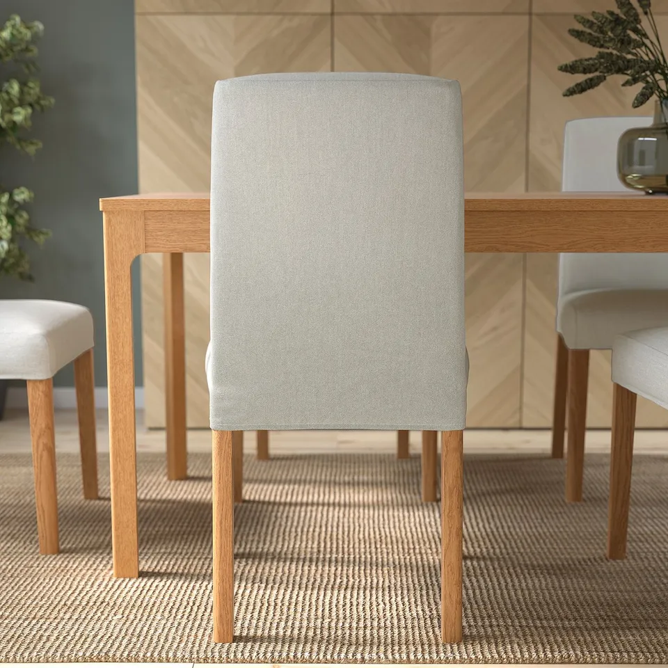 Thoughtfully designed, BERGMUND chair offers comfort with a padded seat and back, perfect for long dining sessions.
