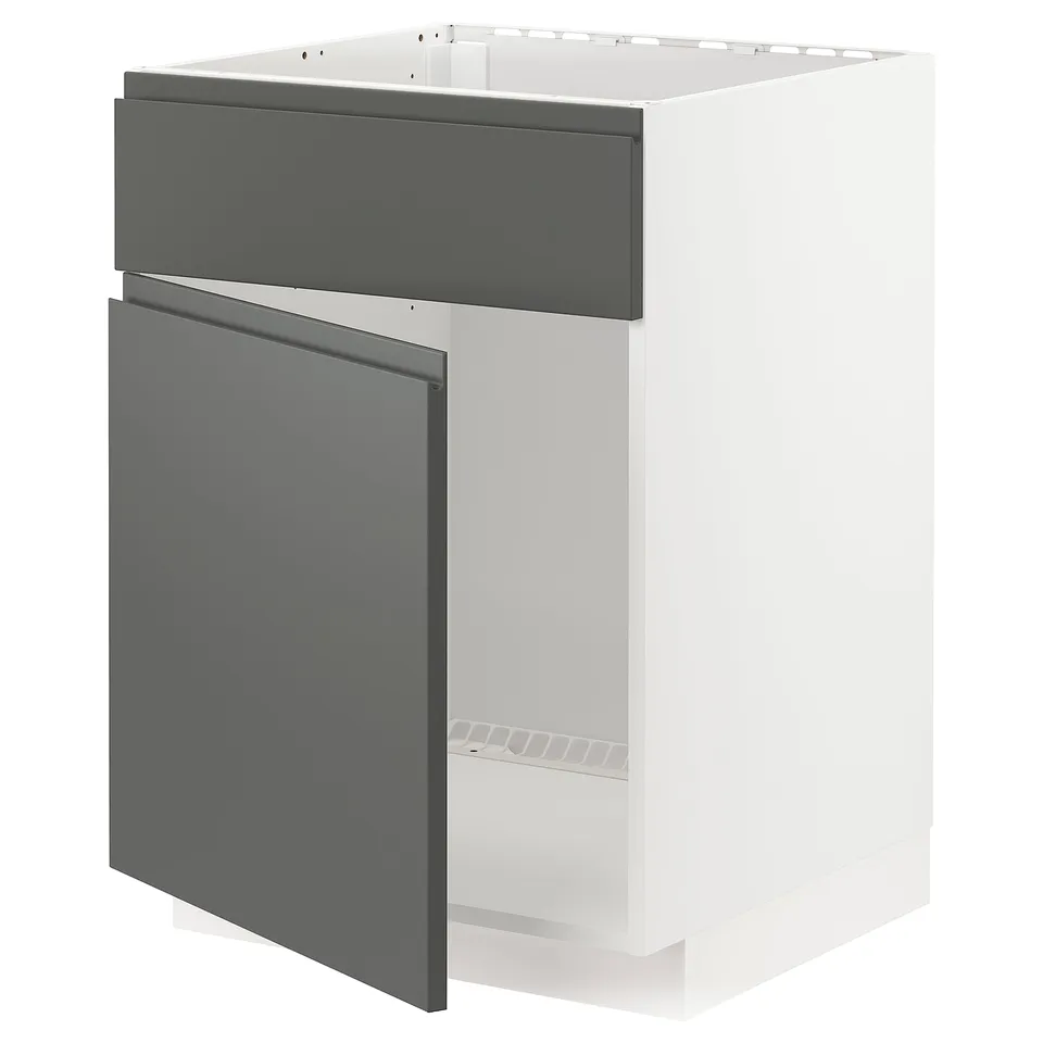 A modern kitchen cabinet in white and matt dark grey with integrated handles.