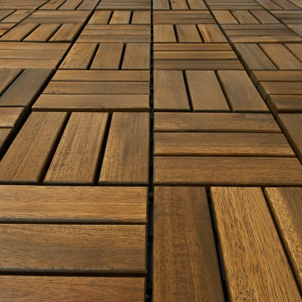Wooden floor tiles arranged in a pattern, showcasing high-quality craftsmanship and a polished finish.