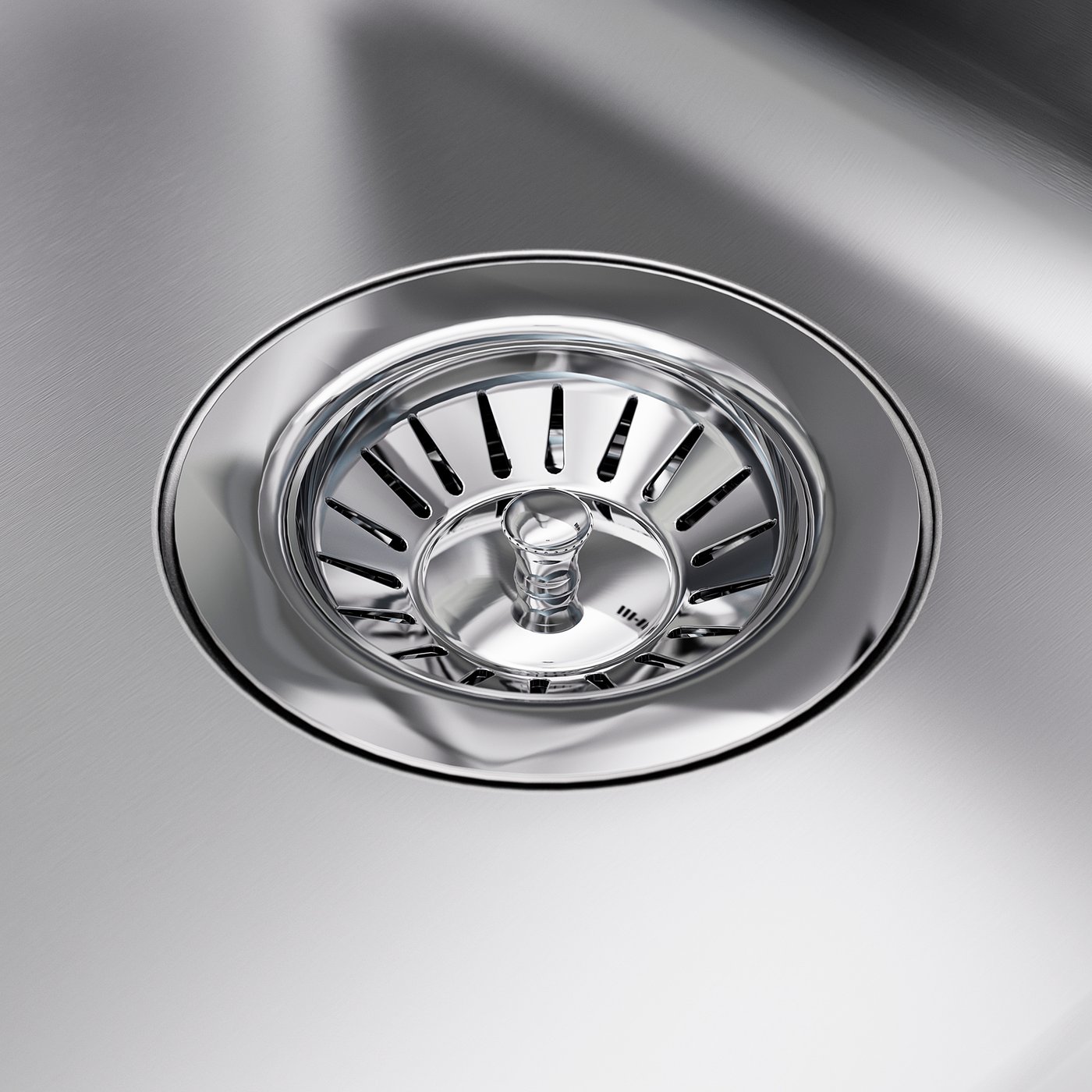Shiny stainless steel sink drain with intricate design, reflecting light.
