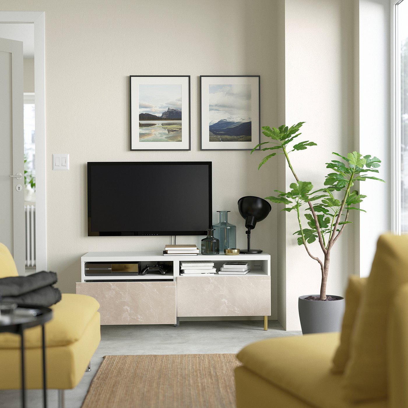 Minimalist living room with grey tv stand, yellow chairs, and plants.