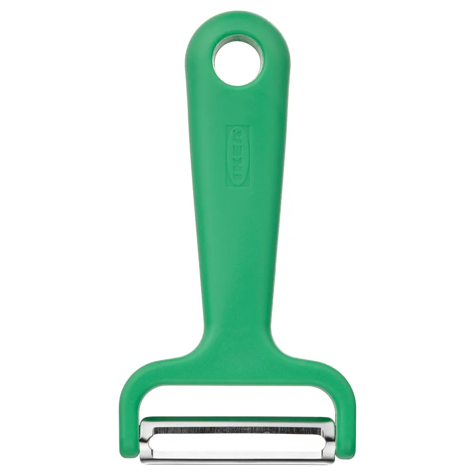 Bright green UPPFYLLD peeler with stainless steel blade, ergonomic handle, and hanging hole.