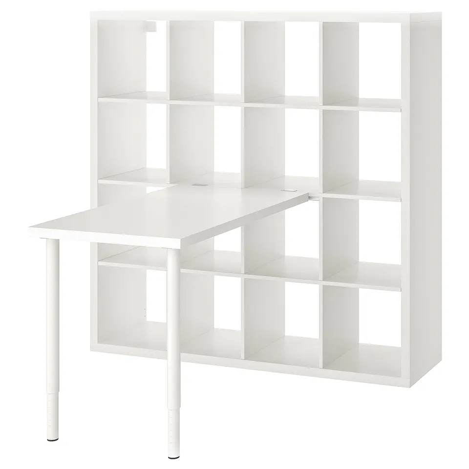 White KALLAX storage unit with open shelves and a table top.