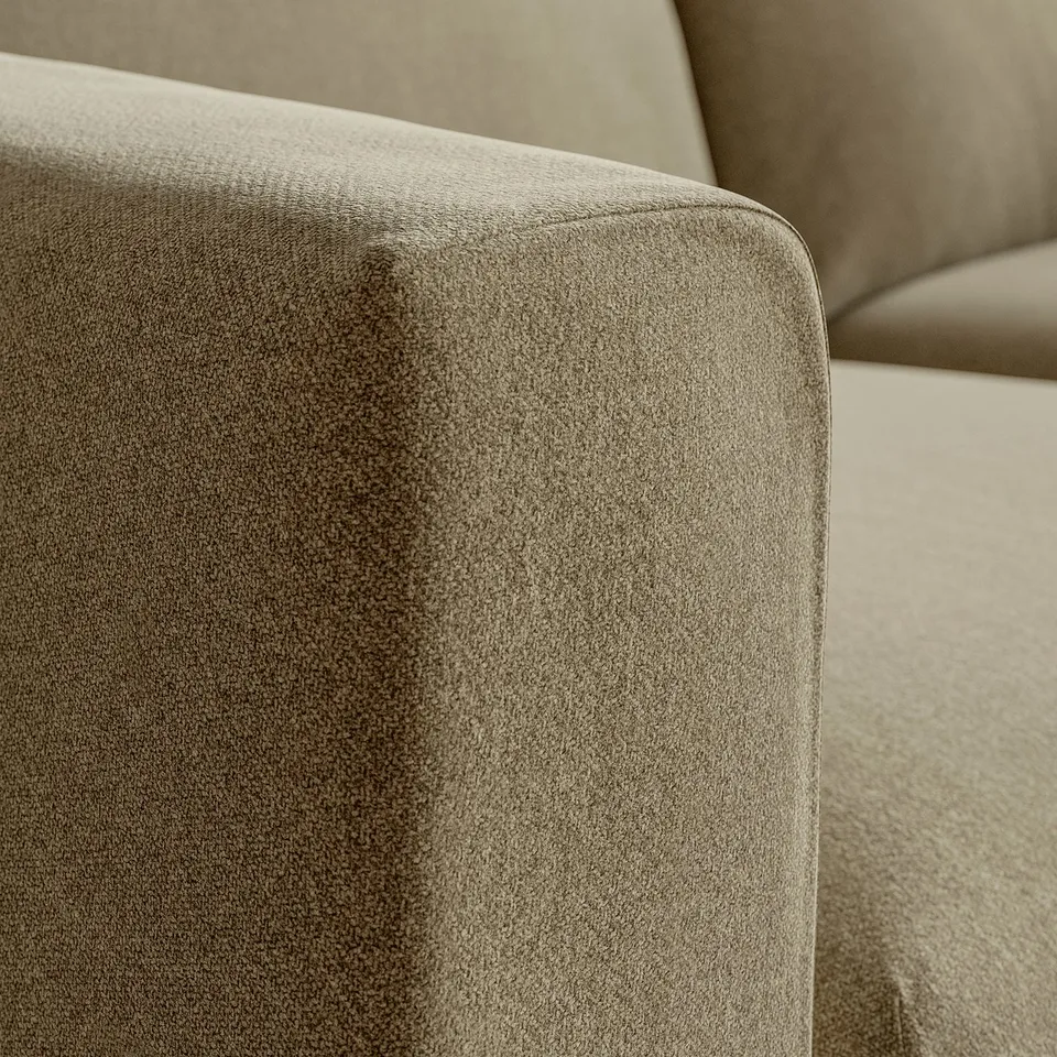 Close-up of soft, beige sofa fabric.
