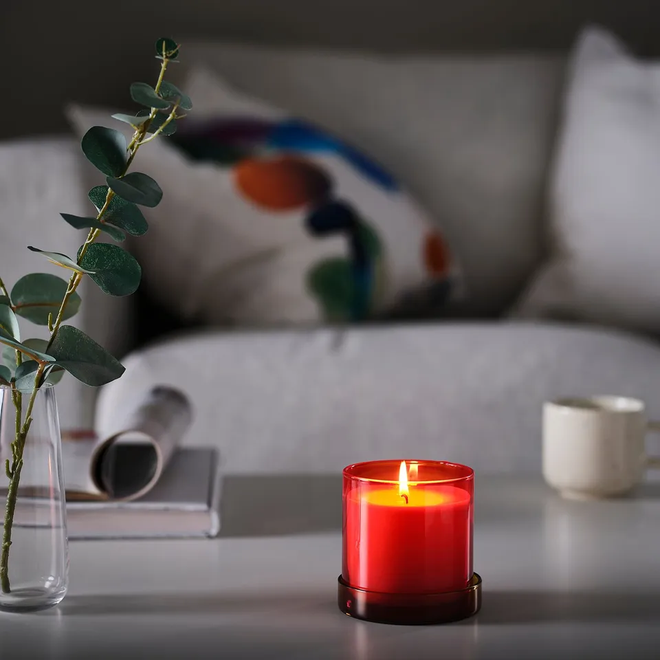 DVÄRGHÖK Scented candle in glass with lid, Citrus flower red-orange/yellow-brown, 50 hr
