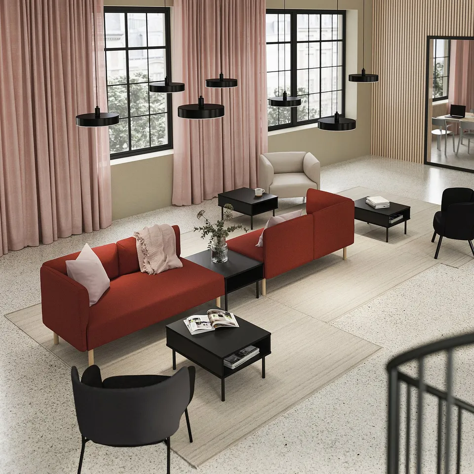 Modern living room with red LILLEHEM modular sofa, black tables, floor lamp, pink curtains, beige walls, and large windows.