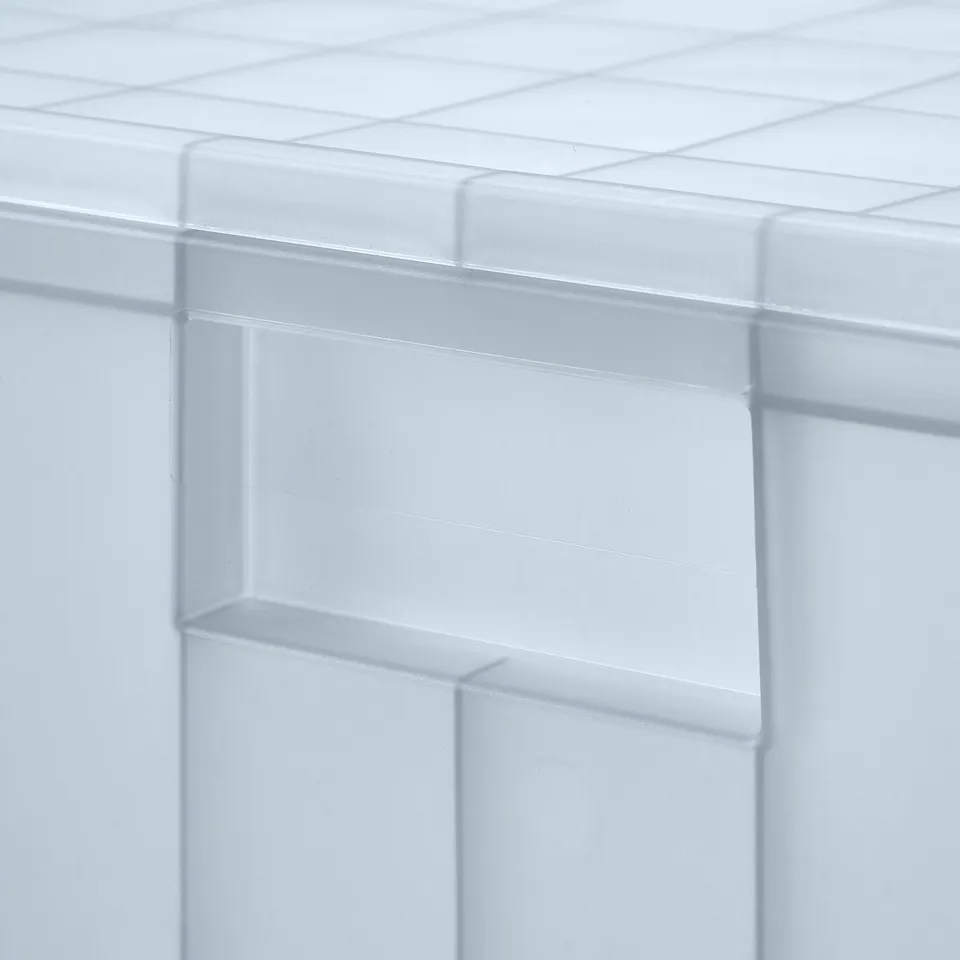 Clear plastic storage box with lid, recycling symbol visible, stacking grooves. Shows contents without revealing all.