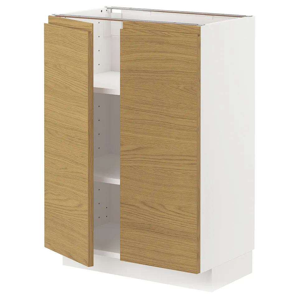 A white METOD kitchen cabinet with oak-finished doors and integrated handles.