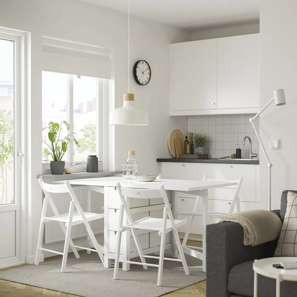 NORDEN table & chairs in small kitchen, maximising space with a cosy, modern feel.