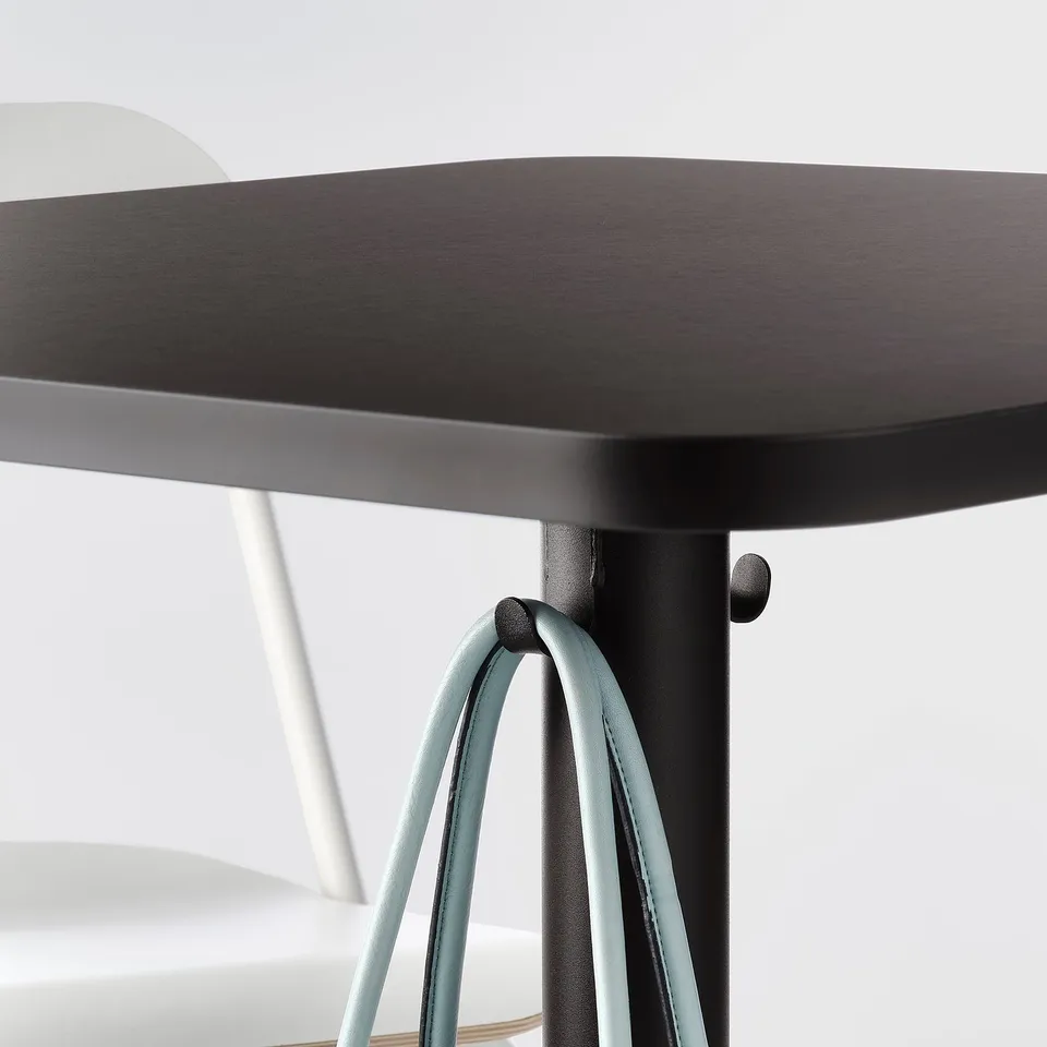 Modern square bar table with stable, adjustable legs and protective feet, ideal for small spaces.