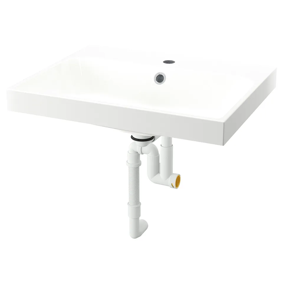 Square white basin with marble texture and soap space, mounted wall with plumbing visible.