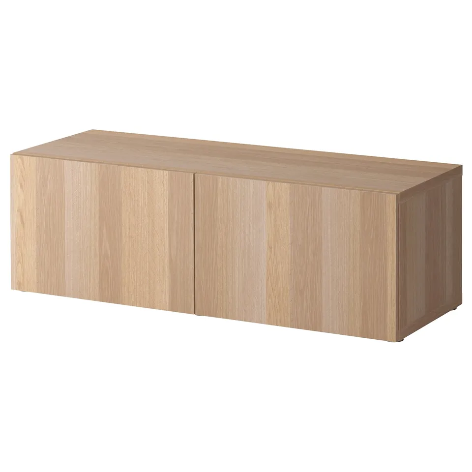 Light wooden storage unit, rectangular, minimalist design. Solid wood texture, two hinged doors.