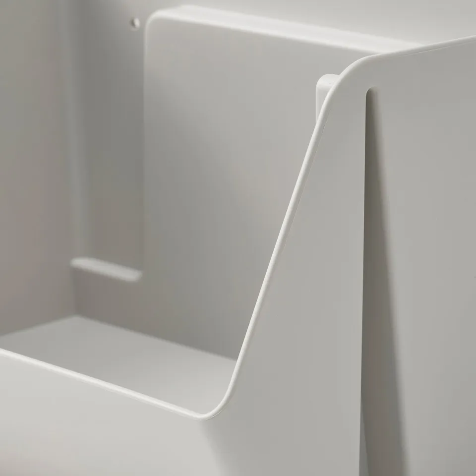 White desk organiser, sleek and modern, featuring a single compartment and an attached hook. Made of durable recycled plastic.