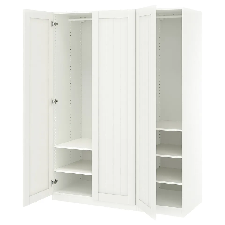 White ikea PAX wardrobe with open doors showcasing shelves, made of fiberboard and particleboard.
