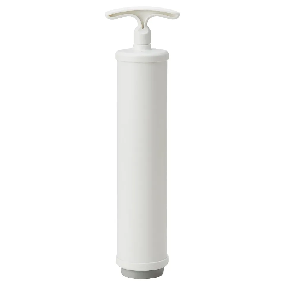 A white manual vacuum pump by TRICKEN, cylindrical with a t-handle on top.
