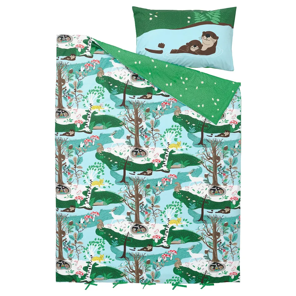 SKOGSDUVA bedding set: green, blue, white with forest creatures - otters, hedgehogs, lynx in nature scene.