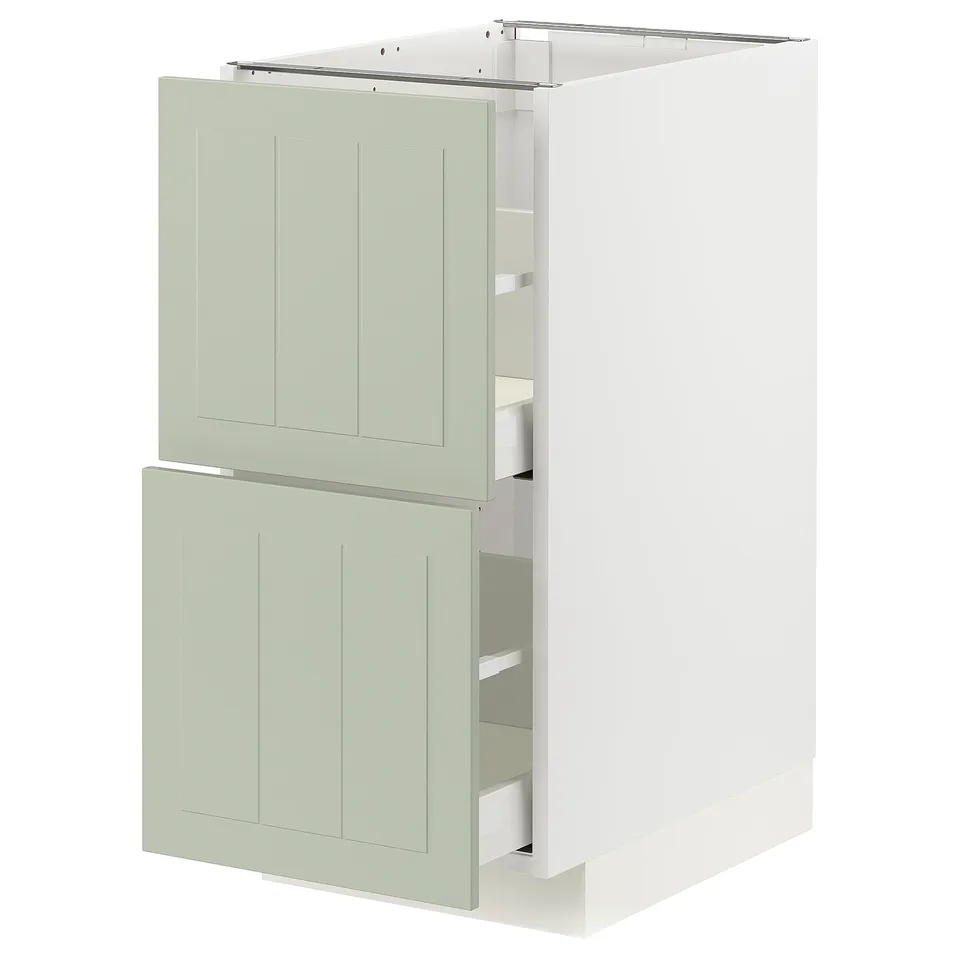 A light green METOD kitchen cabinet with a white frame and two pull-out drawers. It has a clean, modern design.