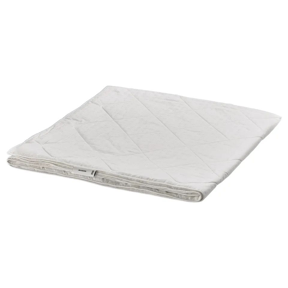 White MJUKDÅN silk duvet, folded, with textured dobby cotton cover and quilted design.