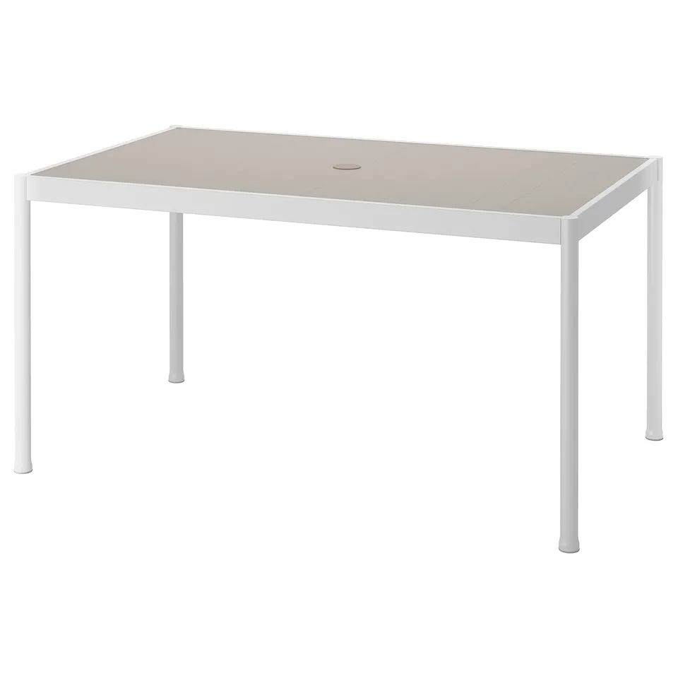An outdoor SEGERÖN table with a beige top and white legs, rectangular shape, made of aluminium and steel.