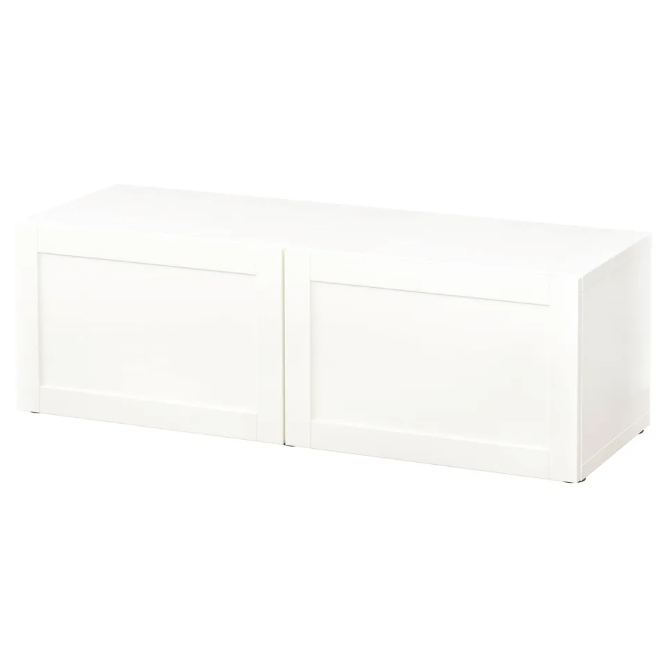 A BESTÅ storage unit in white, rectangular, with a minimalist design and smooth surfaces.