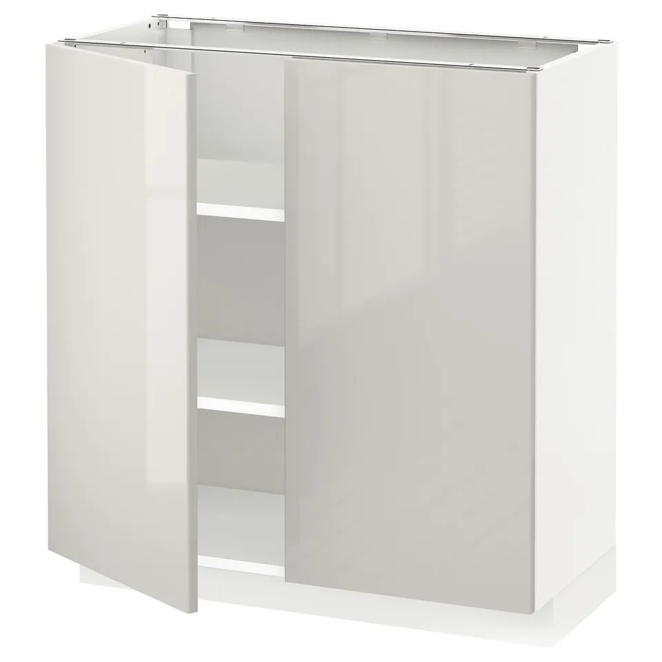 A white METOD storage cabinet with high gloss finish, featuring two open doors exposing inner shelves.