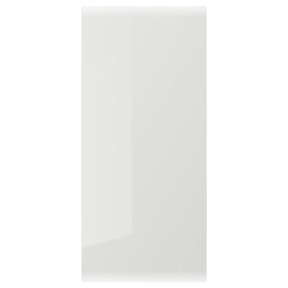 Is of a white RINGHULT kitchen cabinet door with a glossy finish.