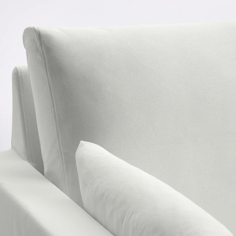 Modern sofa with clean lines and high-quality fabric; invites comfort and relaxation.