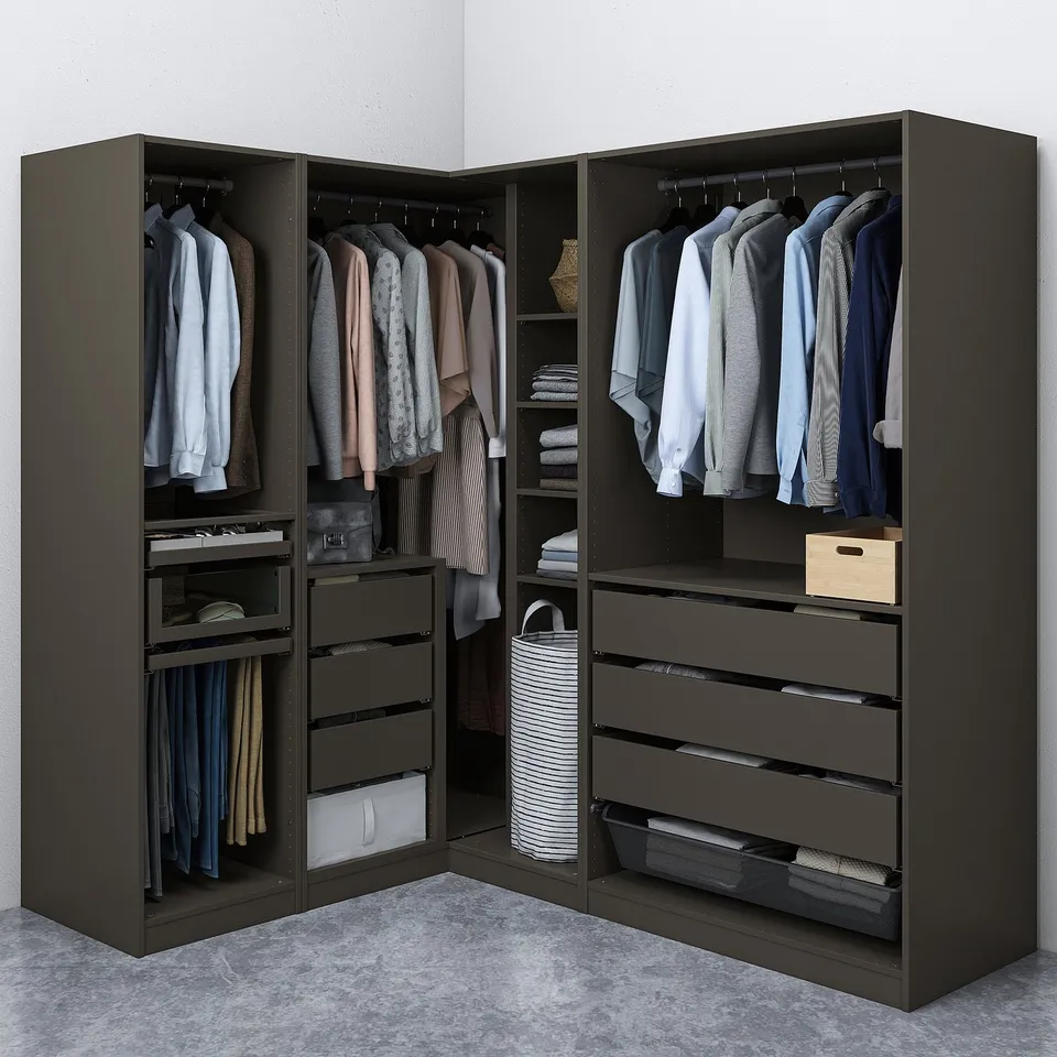 Organised closet with hanging clothes, shelves, and drawers; space-optimized corner design.