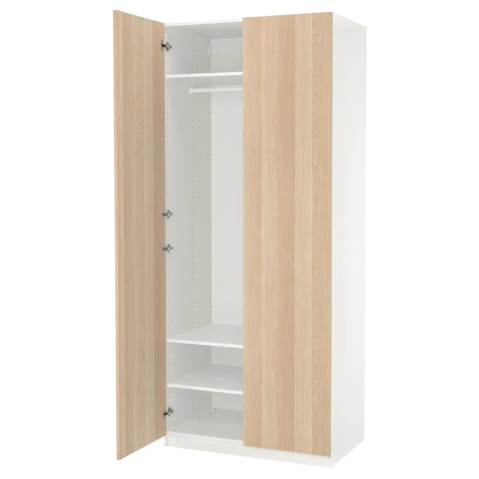 Modern, light-colored wooden wardrobe with two open doors revealing an empty interior, ready for customization.