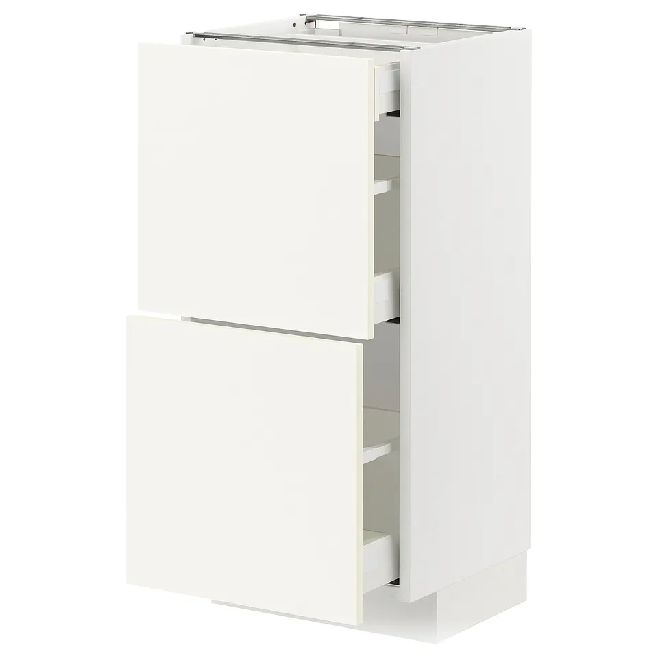 White METOD kitchen cabinet with two drawers and shelves.
