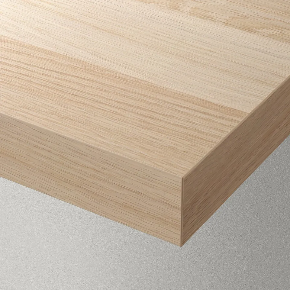 Minimalist light wooden wall shelf with sleek edges, seamlessly blending into the wall, perfect for displaying items.