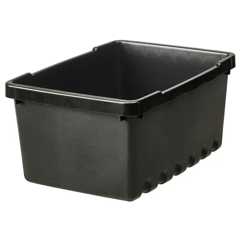 Black plastic storage bin, rectangular shape, sturdy, designed for stacking, with multiple drainage holes.