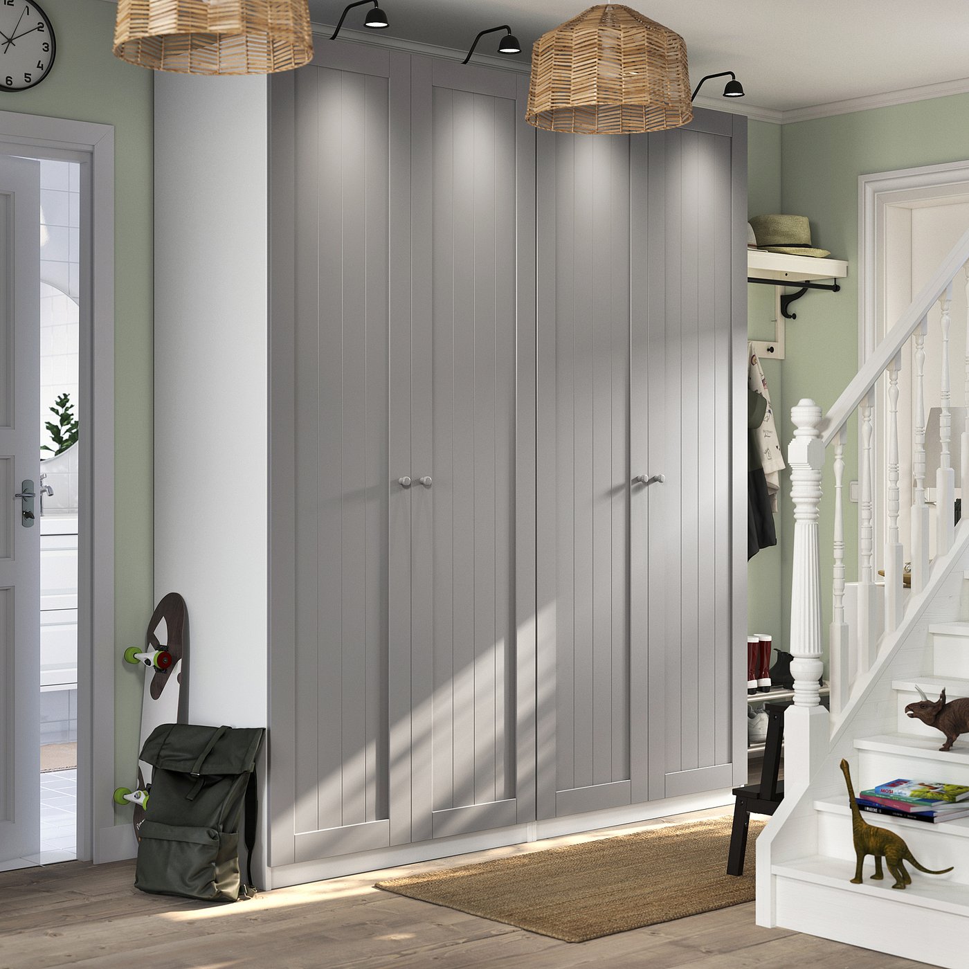Grey GULLABERGh wardrobe in room with green walls, white stairs, beige rug.