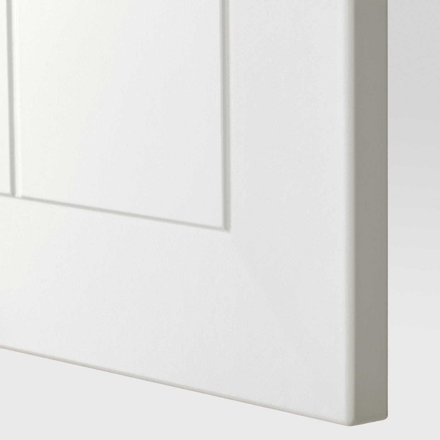 Close-up of white cabinet drawer, smooth finish, clean lines, sturdy build.