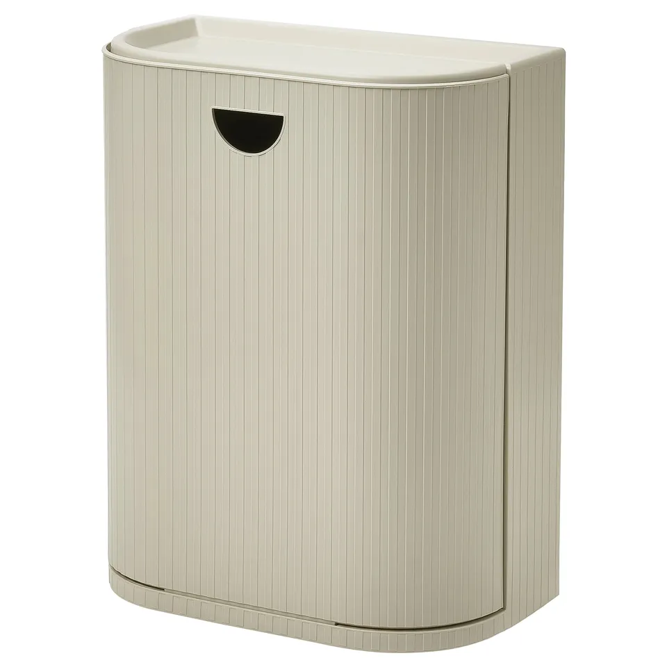 Beige GÅRDSBUTIK recycling bin with textured surface, curved edges, and integrated handle.